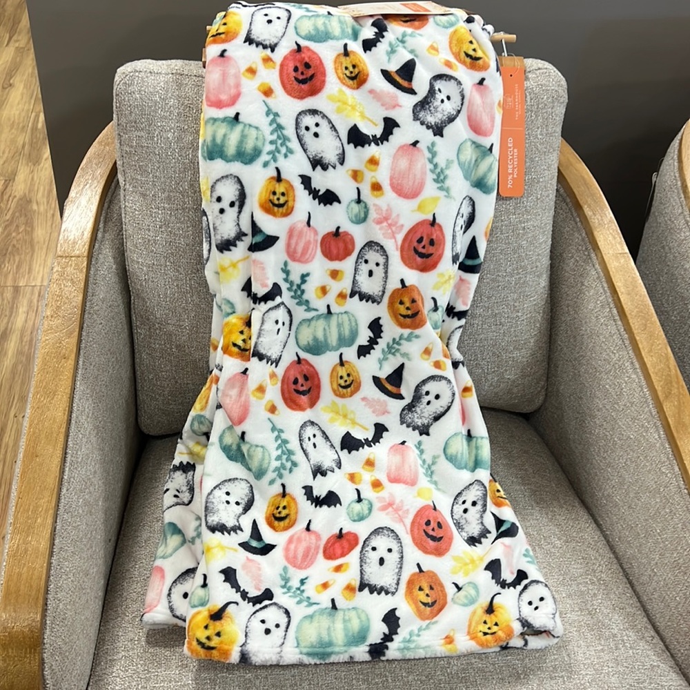 Plush ghosts, bats, and pumpkins Throw